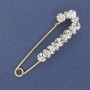 Brooch pin with white rhinestones 79x20mm± gold-toned metal