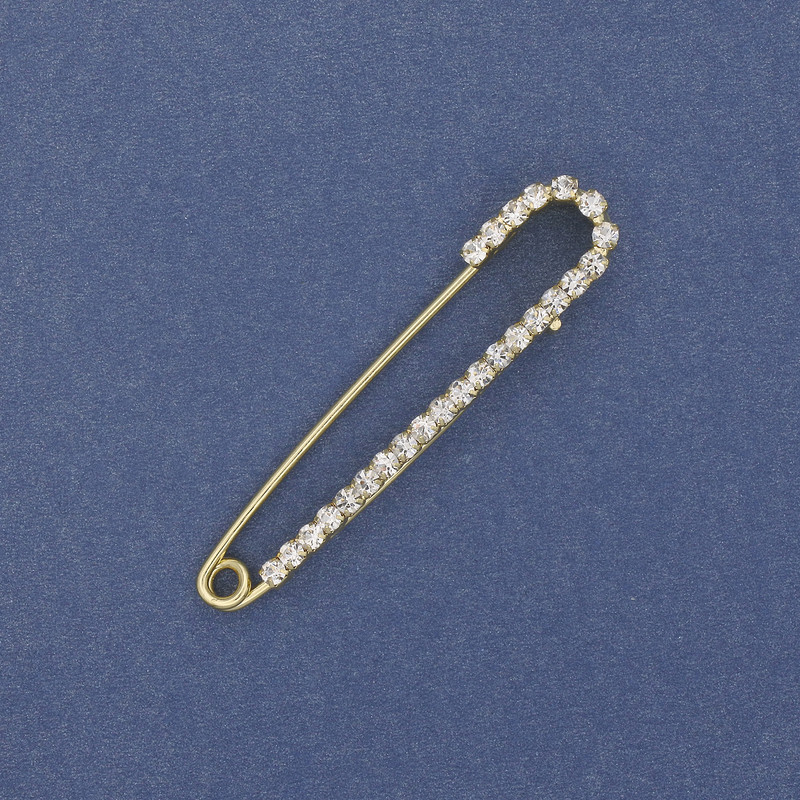 Brooch pin with white crystals 56×11mm± golden metal