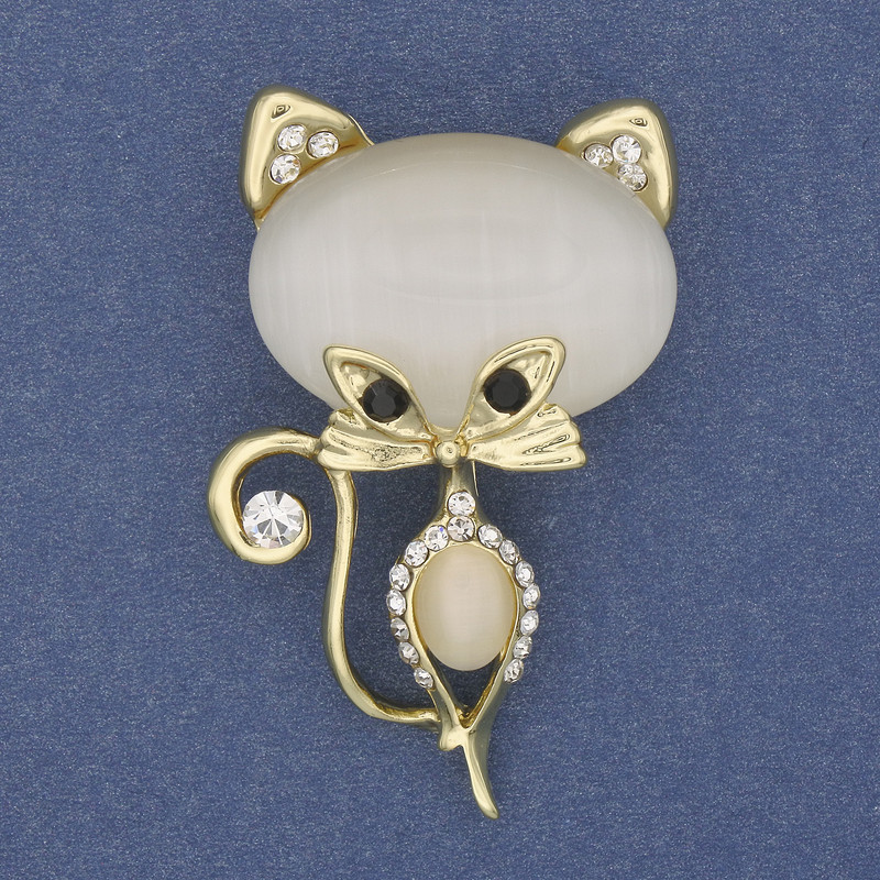 Brooch 'Cat' with white cat's eye and white crystals on golden metal 45×25mm+