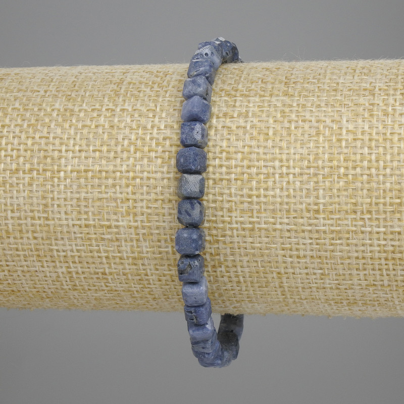 Bracelet of fossilised coral, faceted cube 5×5mm, 18cm stretch
