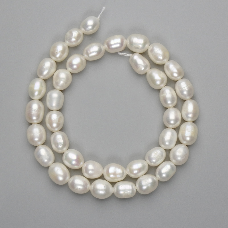 Natural freshwater pearl beads 9–10×7–8mm, on a thread, 36cm length