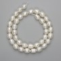 Natural freshwater pearl beads 9–10×7–8mm, on a thread, 36cm length