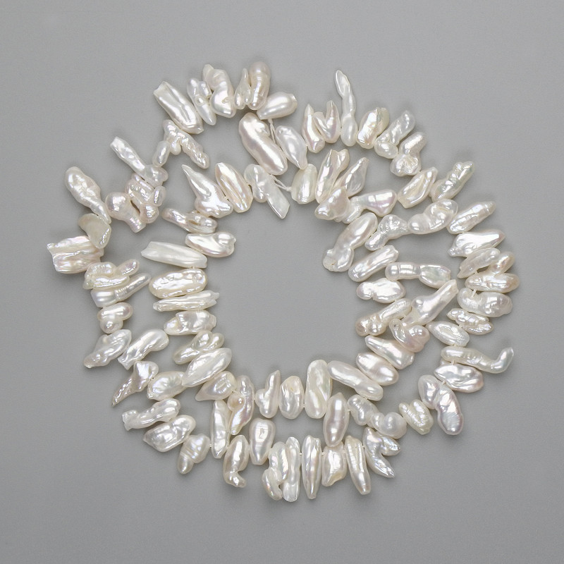 Baroque pearls with petrol tint on thread 7-14×3-7 mm, length 38 cm ±