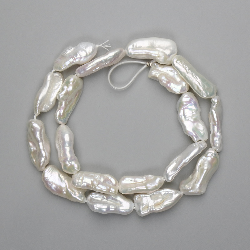 Baroque pearls with petrol glow on a thread 20-26×9-12 mm, length 41 cm