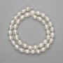 Freshwater pearl beads, natural, 9–10×7–7.5 mm, on a thread, 36 cm approx