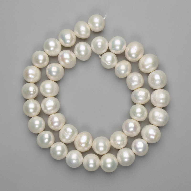 Freshwater pearl beads 10.5–11 mm on a thread, 38 cm length