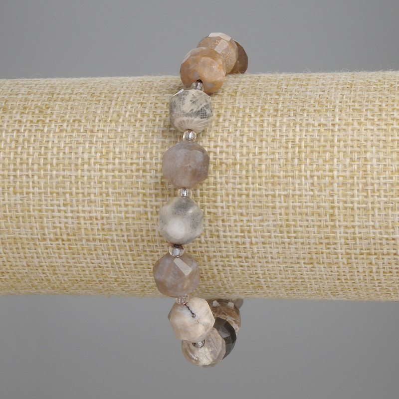 Fossilised coral bracelet, facets, 10×9mm+-, 3mm+ beads, length 18cm+- stretch