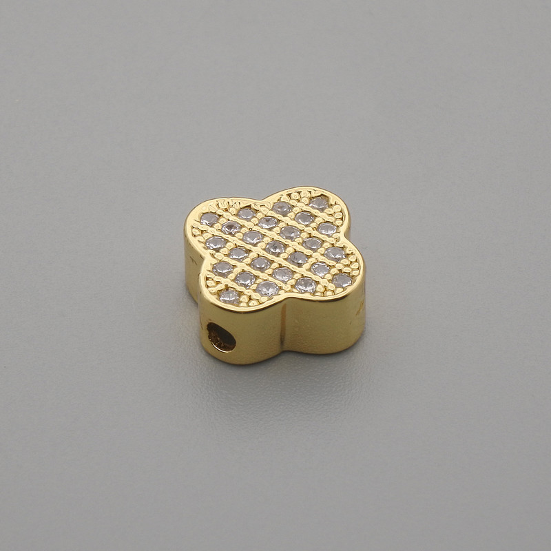 Bead finding insert shamrock crystal with metal colour gold, diameter 10mm± hole diameter 1.6mm± per piece