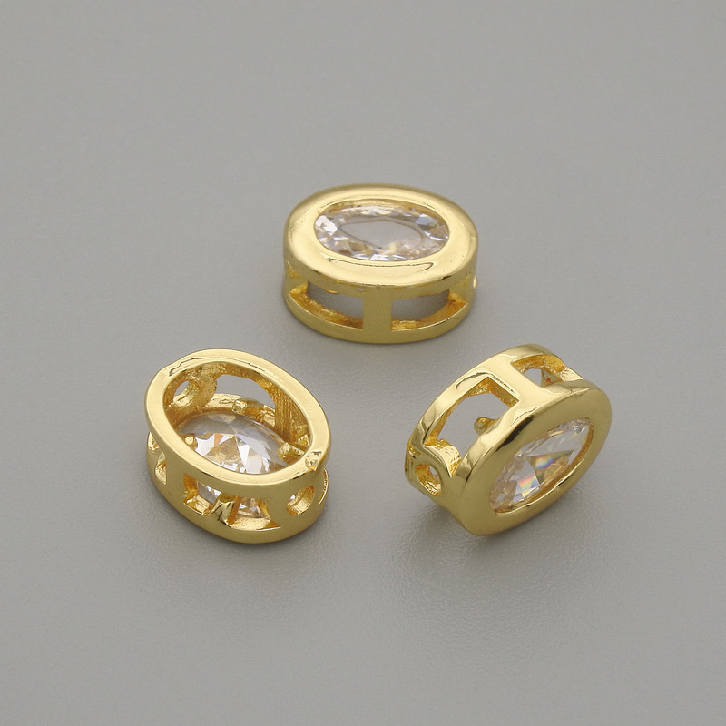 Bead insert with white crystal, metal gold-toned oval setting, 9×7mm approx. hole 1.3mm approx. per 1 pc.