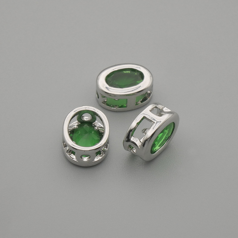 Bead Finding Insertion with Green Crystal, Silver Oval Metal Finish, Ø 9×7 mm ± hole Ø 1.3 mm ± per piece