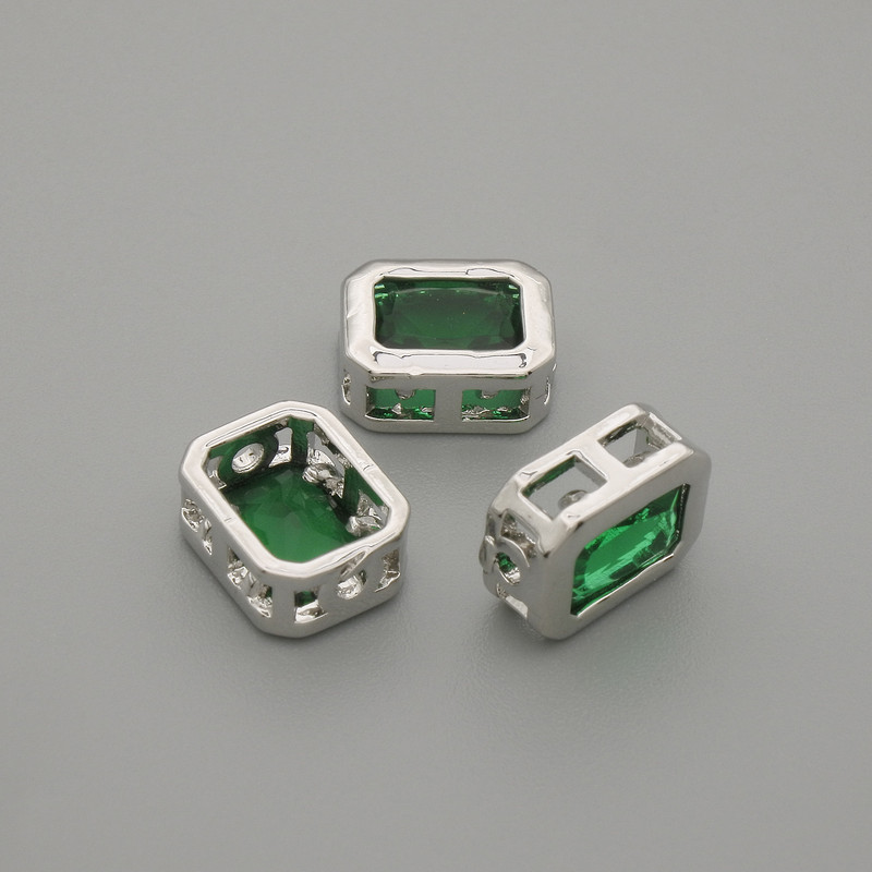 Bead insert with green crystal, metal colour silver, diameter 9x7mm±, hole diameter 1.3mm± per 1pc