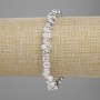Bracelet Lava with silvered metal plating, porous faceted bead, 6.5-8.5mm, 4-5mm, length 18cm, stretch