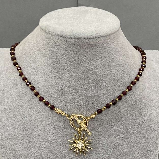 Choker Garnet Faceted Bead 4mm+- Hematite bead 2mm+- with Sun Pendant 20mm+-, length 37cm+- and Toggle Clasp