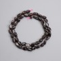 Garnet faceted beads 8–12×5–6 mm, on thread, approx. 39 cm