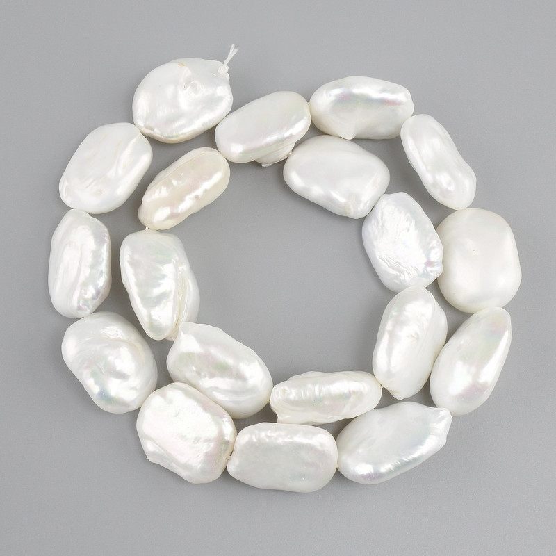 Baroque Pearls with a Petrol tint, flat 18–21×14–15 mm +-, length 37 cm +