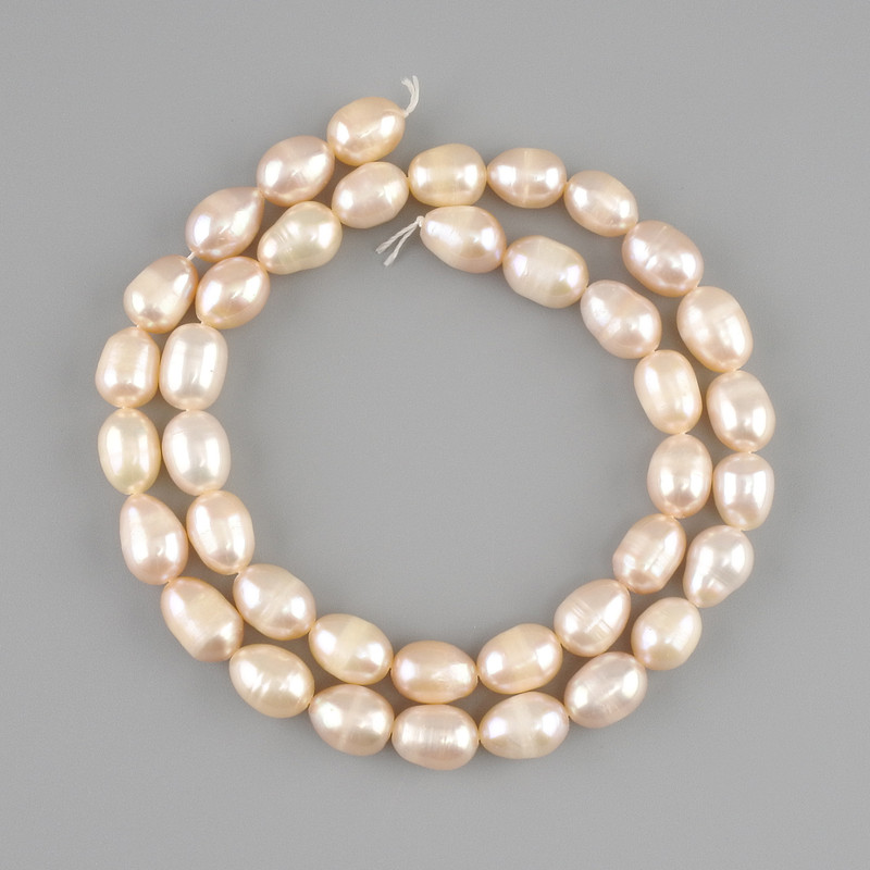 Natural freshwater pearls on a thread, colour soft peach 8–10×6.5–7 mm, length 37 cm