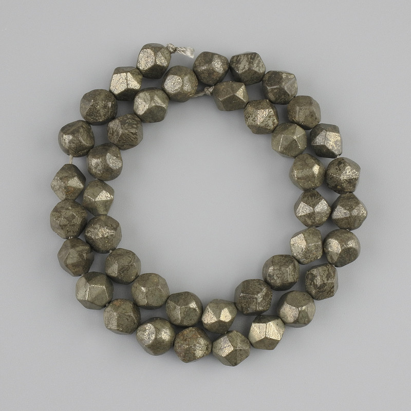 Pyrite Beads multifaceted 8-8.5×7-8 mm+, length 35 cm on a thread