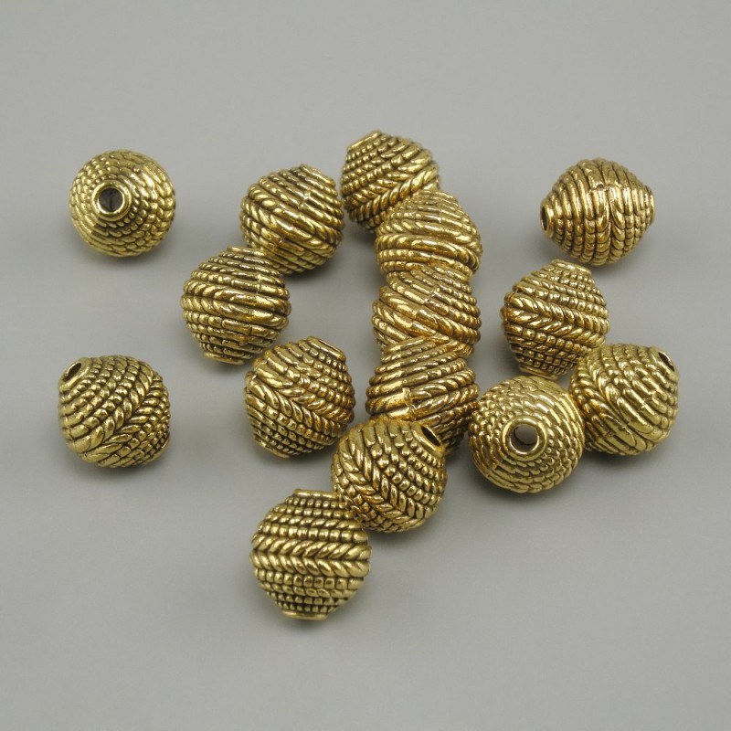 Bead insert, bead core in yellow gold colour, diameter 8x7.5 mm ±, hole diameter 1.8 mm, packaged 20 g (~15 pcs)
