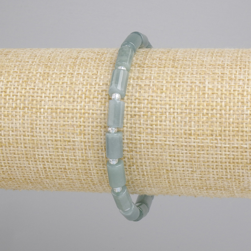 Jadeite Cylinder Bracelet, diameter 8×5 mm± with 3 mm beads, length 18 cm± stretch