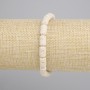 Bracelet beige Vit volcanic lava cylinder, diameter 10×6mm, ±, length 18cm ± stretch