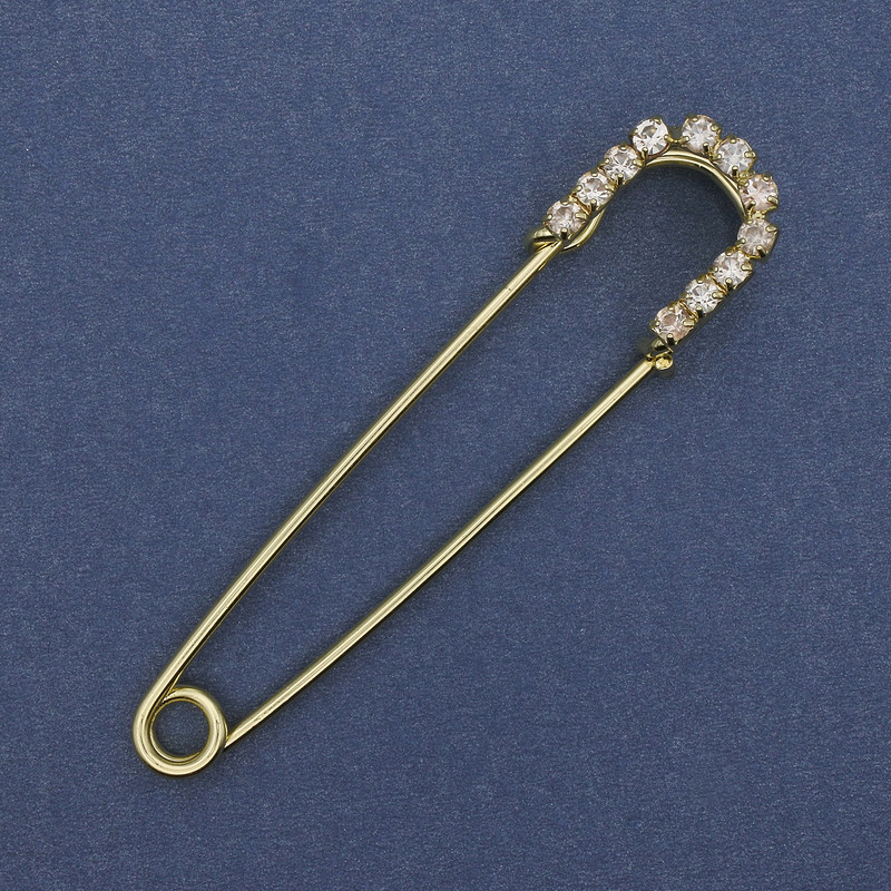 Brooch / Pin with white crystals, gold-toned metal