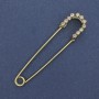 Brooch / Pin with white crystals, gold-toned metal