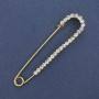 Brooch pin with white crystals 72×17mm± golden metal