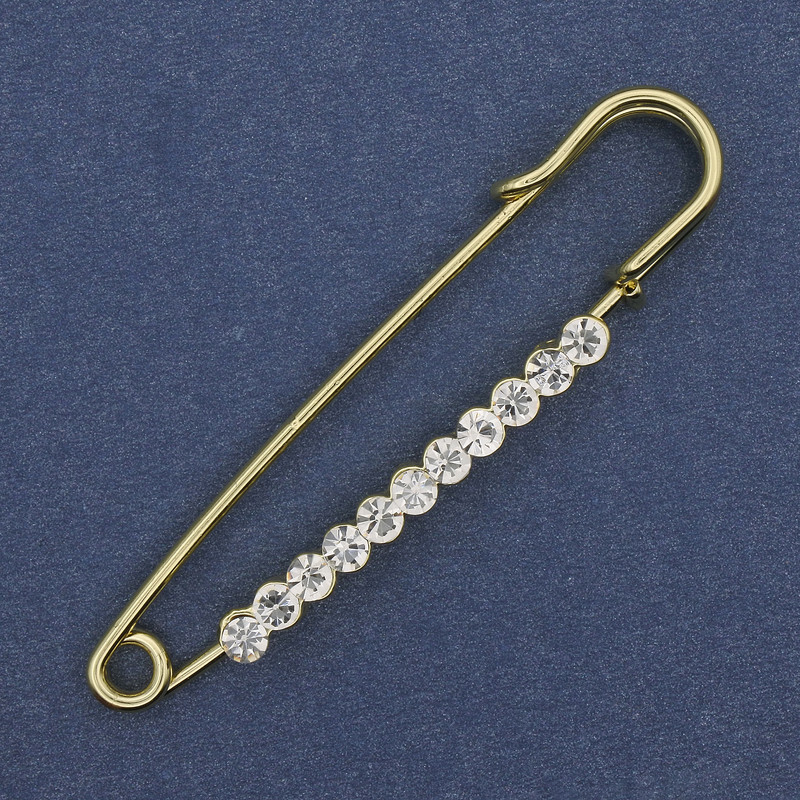 Brooch pin with white crystals 60×12mm± golden metal