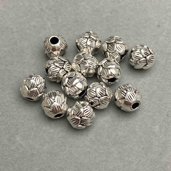 Bead finding insert colour metal - silver, diameter 7mm±, hole diameter 2.2mm±, packaging 20g ~19 pcs.
