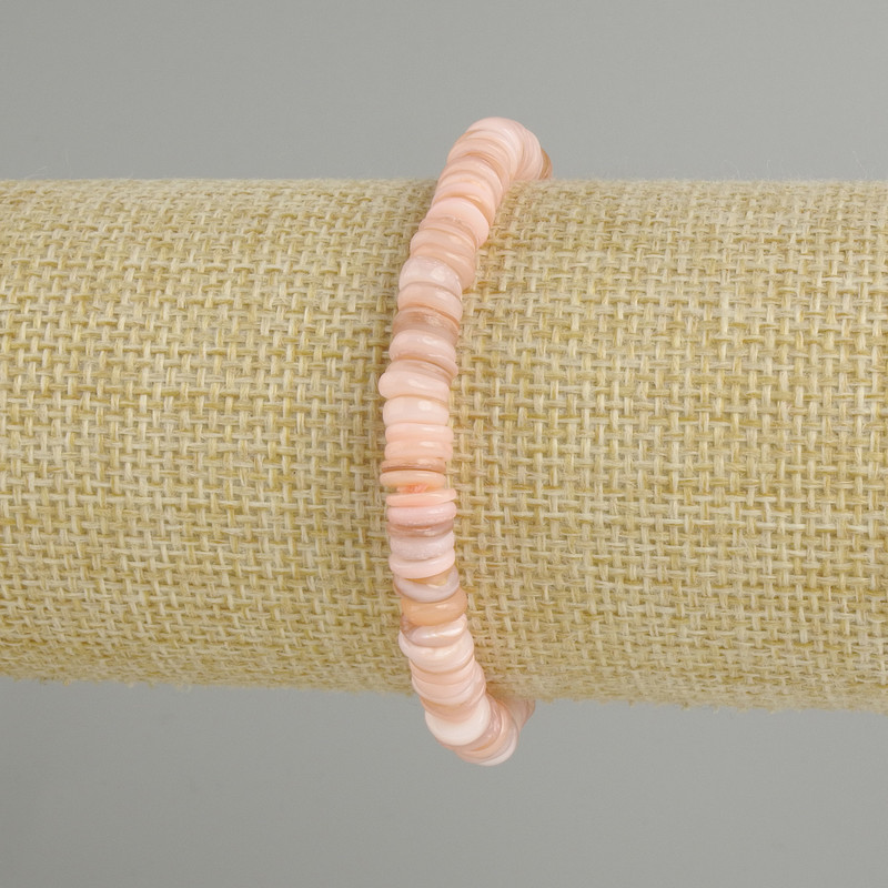 Bracelet with Cowrie Shells Skarfaker rondelle, diameter 6×1.5–2 mm, stretchy 18 cm long ±