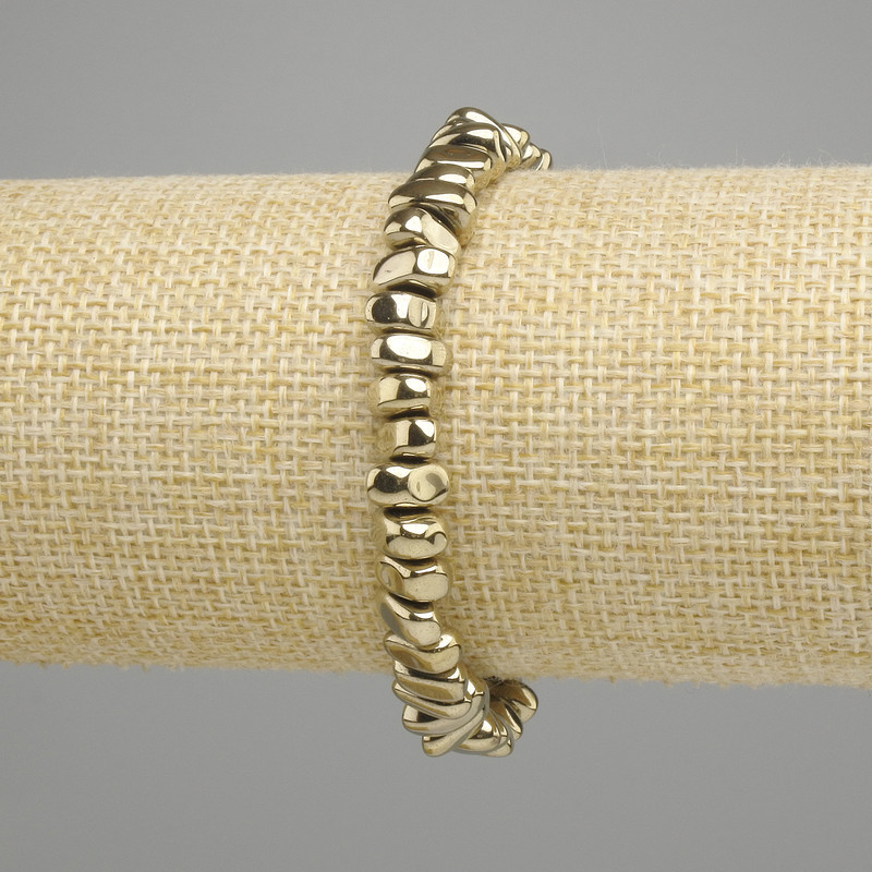 Hematite Bead Elastic Bracelet 8-9×3.5-4 mm, golden colour, length 18 cm ± stretch