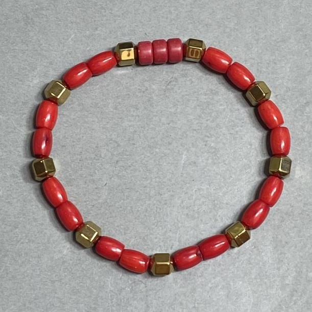 Bracelet Coral Barrel 7x5mm+- Hematite Faceted 6mm+-, length 18cm +- stretch