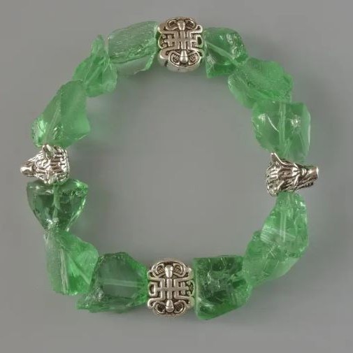 Bracelet Quartz, toned green, unpolished stone faceted, 10x13mm approx, bracelet length 18cm, elastic with metal inserts