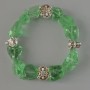 Bracelet Quartz, toned green, unpolished stone faceted, 10x13mm approx, bracelet length 18cm, elastic with metal inserts