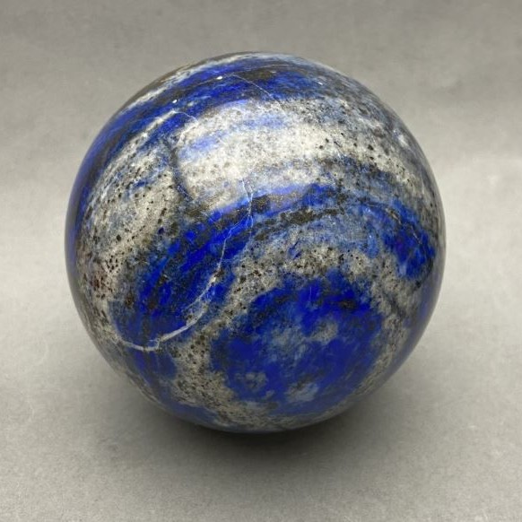 Natural stone souvenir sphere Lazurite, diameter 73 (±) mm. Weight 642 g
