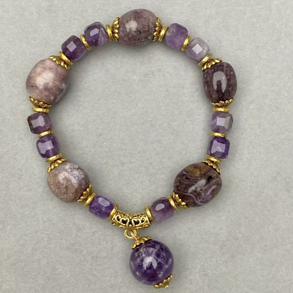Amethyst bracelet tumbled 15×12 mm + faceted cubes 7 mm with inserts, length 18 cm +- stretch
