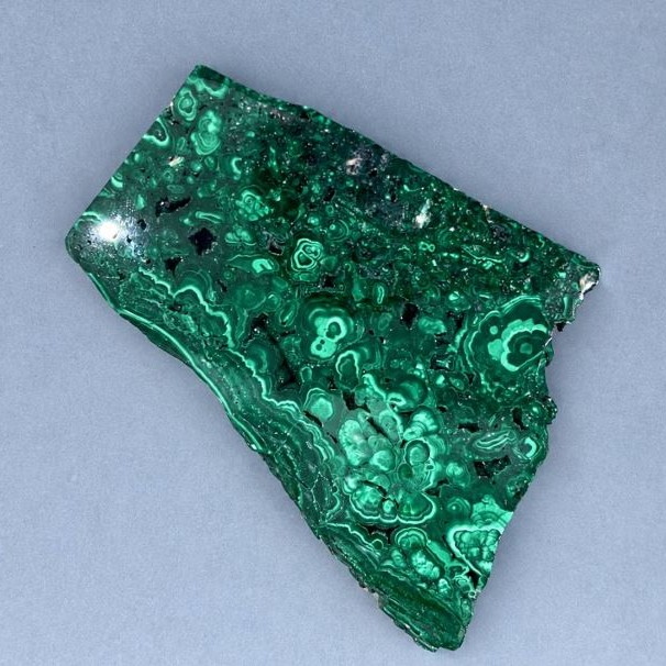 Souvenir plate made of natural stone Malachite 90x65x10 mm ± weight 150 g