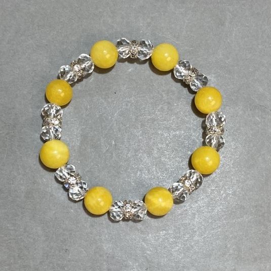 Bracelet Citrine (acrylic) smooth bead 10mm+- Czech crystal faceted rondelle 8x6mm+- length 18cm+- stretch