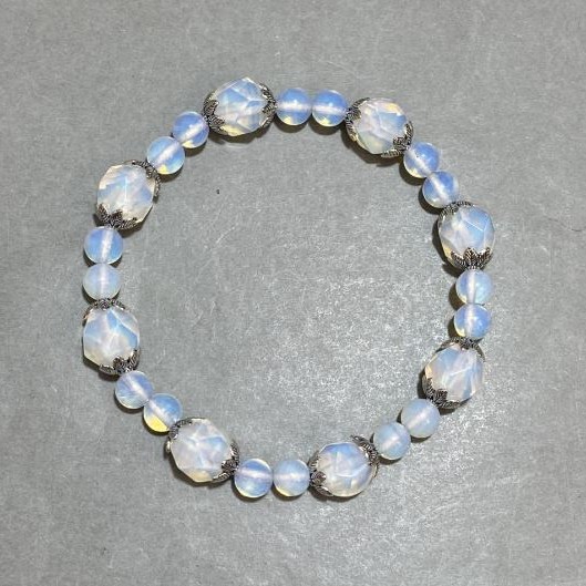 Opalite bead bracelet 6mm± faceted 9mm± with inserts, length 18cm± stretch