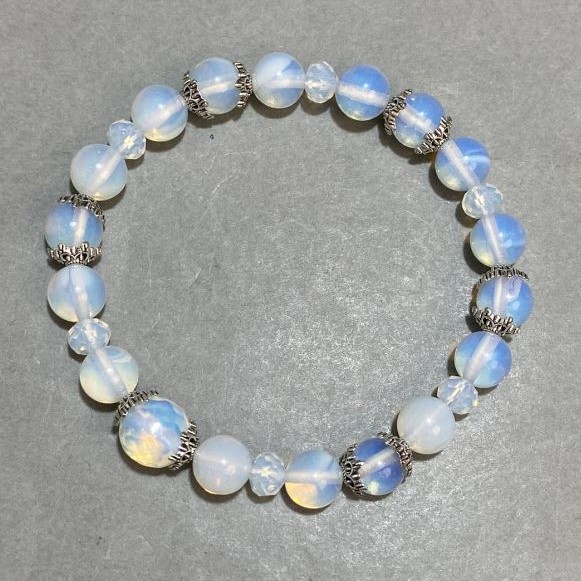 Opalite bracelet round bead 8mm± faceted rondelle 6x5mm± with inserts, length 18cm± stretch