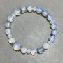 Opalite bracelet round bead 8mm± faceted rondelle 6x5mm± with inserts, length 18cm± stretch