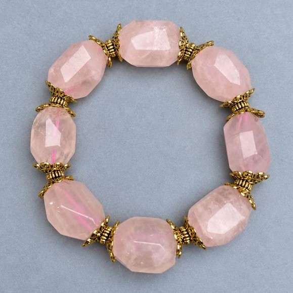 Bracelet Pink Quartz tumbled chips, diameter 20x15mm +/-, length 18cm +/- stretch
