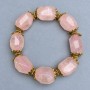Bracelet Pink Quartz tumbled chips, diameter 20x15mm +/-, length 18cm +/- stretch