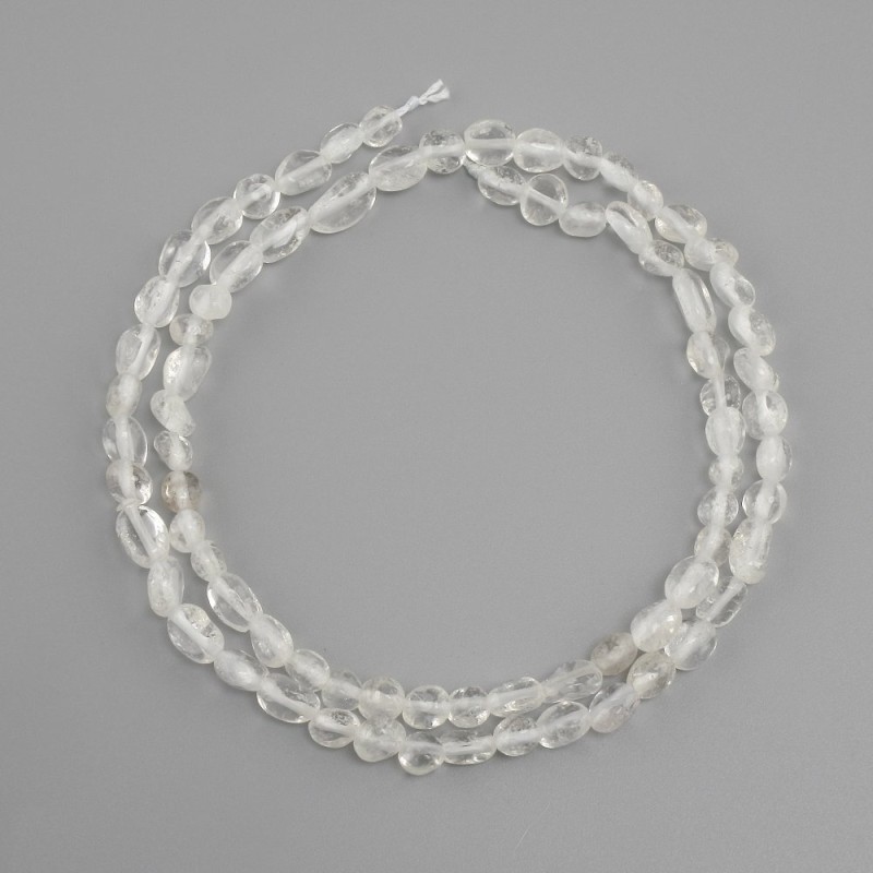 Mountain crystal tumbled beads, diameter 5-7x4-5 mm (±), length 39 cm (±)
