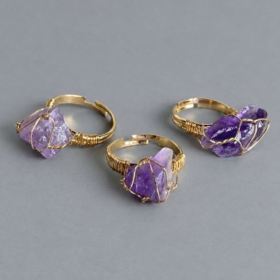 Ring, amethyst sizes in a woven setting 10-16x10-12mm+- (assorted sizes)