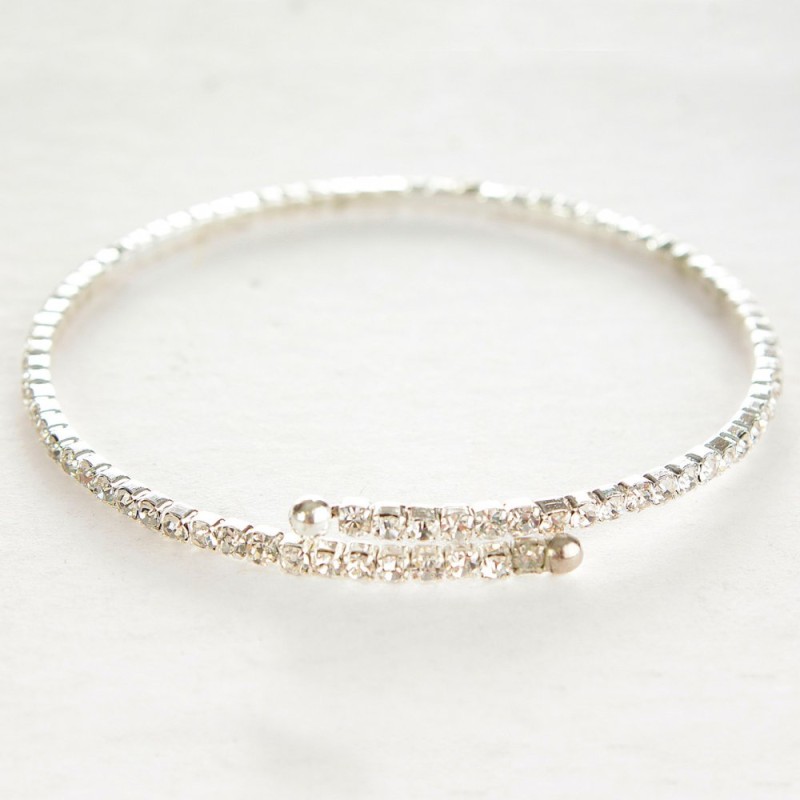 Slim spiral bracelet on a single loop with white small rhinestones, 18–22 cm circumference