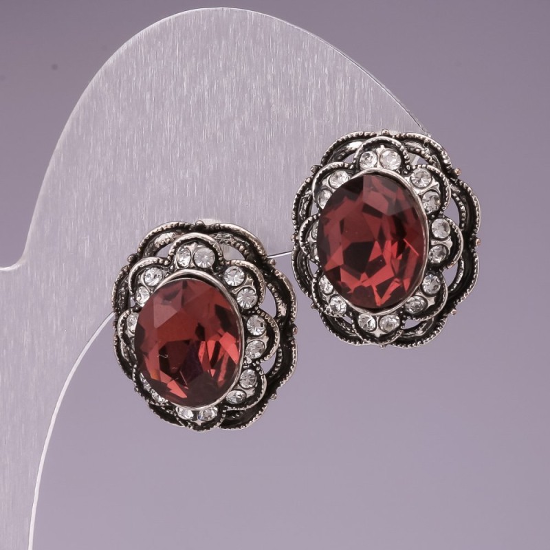 Stud earrings with pink oval crystals and lace-like bezel set with rhinestones, 17mm