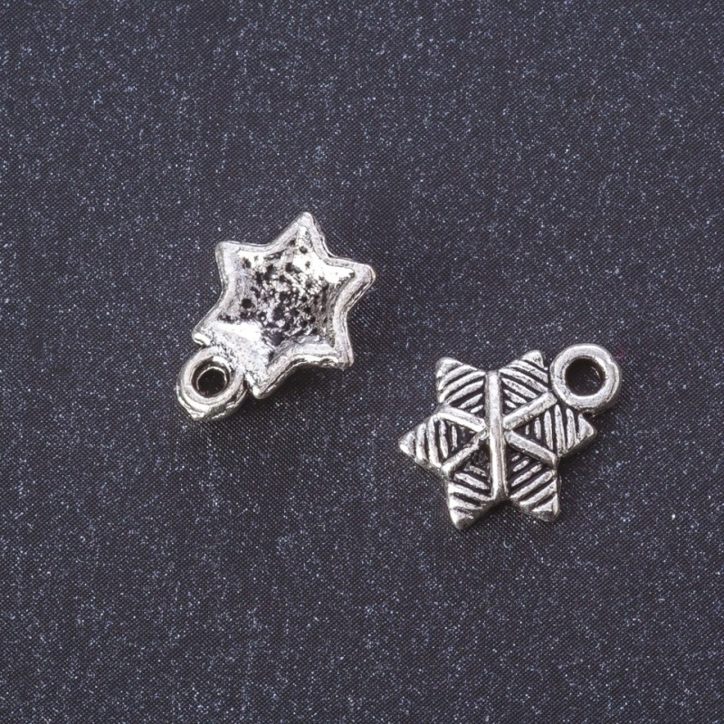 Findings Charm "Christmas Star" metal colour "silver" 13x11mm pack 20g +/-35 pcs