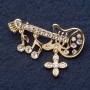 Brooch "Precious Guitar" 5x2cm with rhinestone charms, yellow metal