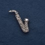 Brooch "Saxophone" 5x2cm, grey metal